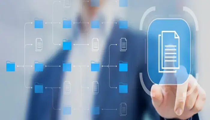 A person interacting with a virtual interface featuring interconnected document and folder icons, representing process documentation in a digital environment.