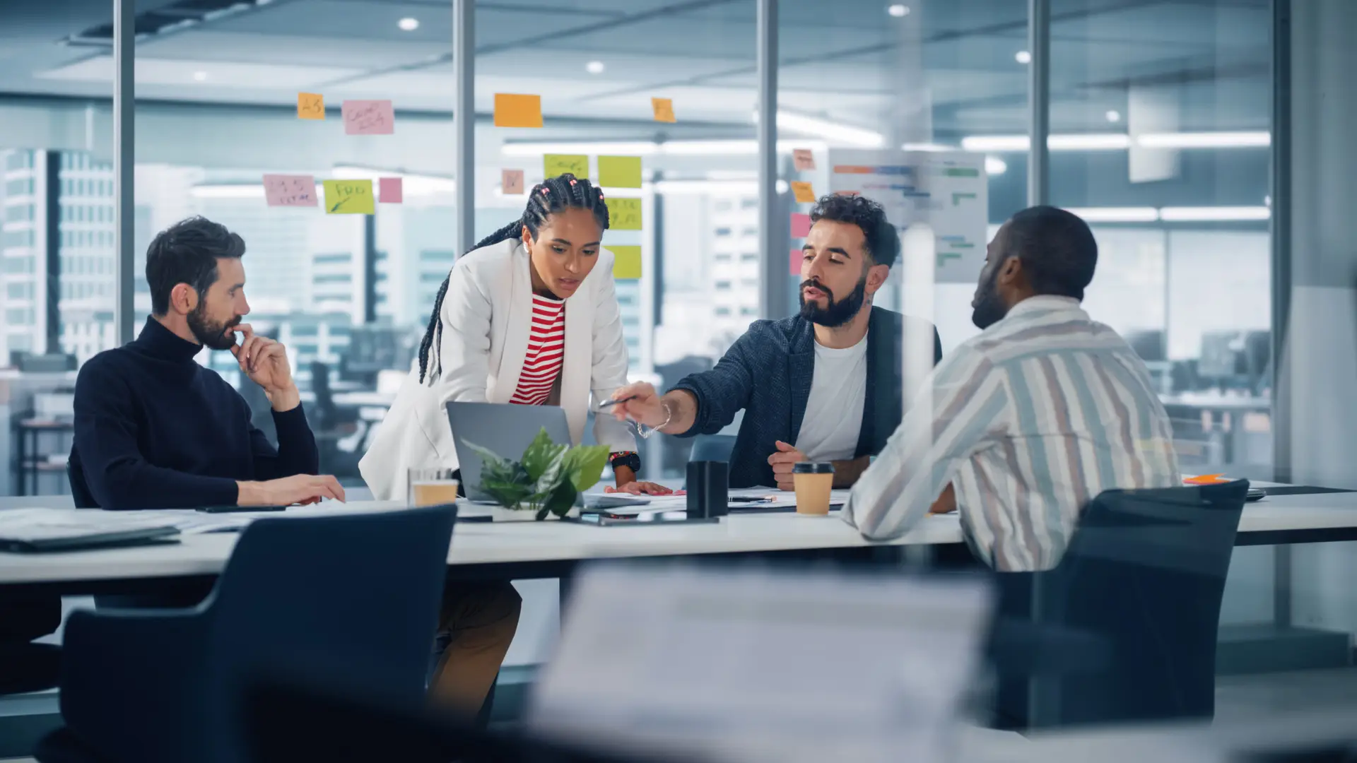 a group of employees in a meeting room